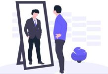 Developing a Winning Personality for Management Success A diverse group of professionals standing in a conference room