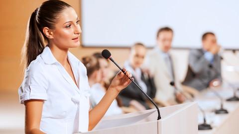 Image of a woman confidently speaking to an audience