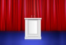 Mastering Public Speaking for C-Level Executives C-Level executives speaking in front of an audience