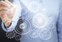 Business professionals engaging in non-verbal communication